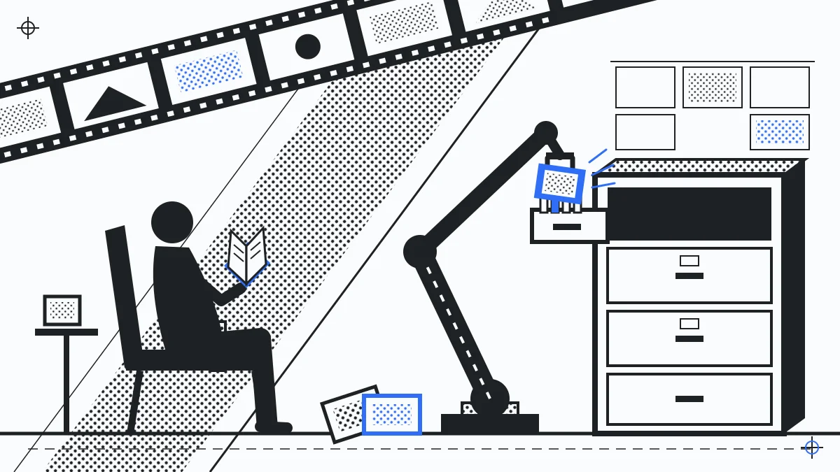 robot arm sorting photos while a person reads